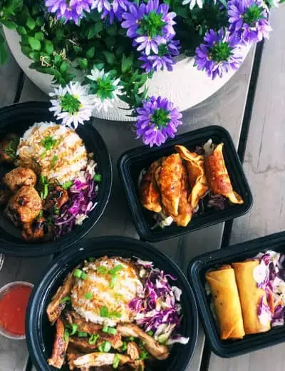 A food truck outdoor picnic with Asian Fusion meals